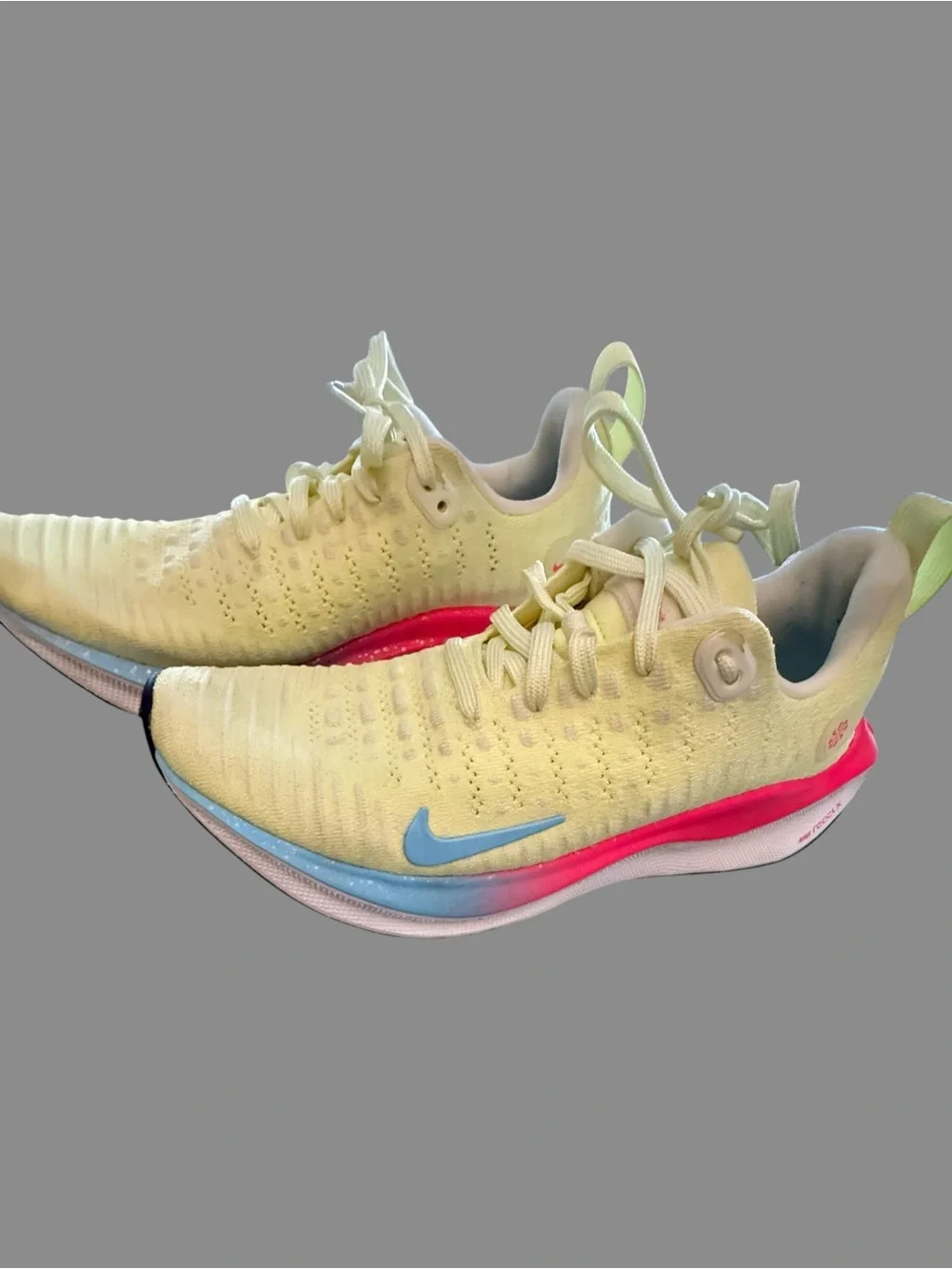 Nike Pale Yellow Running Shoes with Pink Midsole & Sky Blue Swoosh